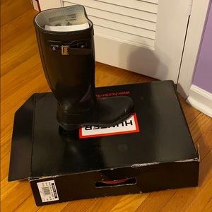 Black glossy Hunter brand rain boots